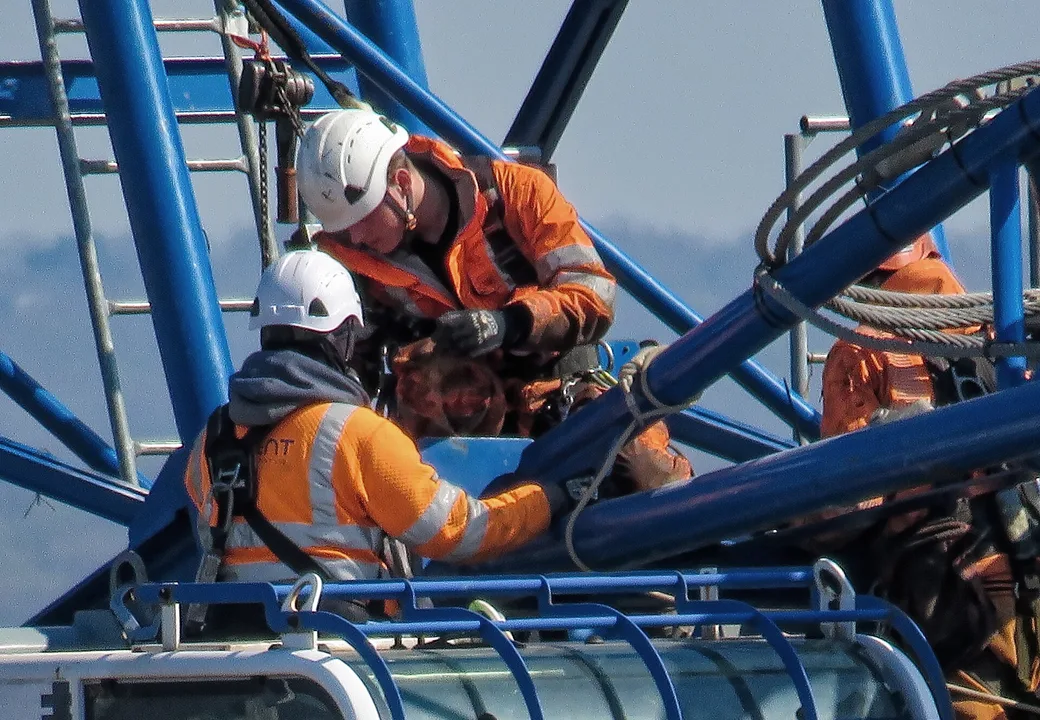 Engineers and technicians on an industrial project site